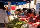 Shoppers sift through piles of produce at the Heart of the City Farmers’ Market in San Francisco’s United Nations Plaza. (Photo by Elisabetta Silvestro/Bay News Rising)