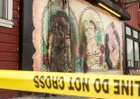 Yellow police tape surrounding the recently burnt LGBT mural Por Vida by Manuel Paul on Bryant St (Photo by Khaled Sayed/Bay News Rising)