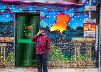 The art gallery curator Kevin Dickson stands in front of 2 Cool 4 School Gallery on Geary Street in San Francisco. (Photo by Emilia Rosales/Bay News Rising)